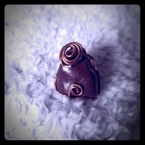 A Red Jasper wired wrapped stone